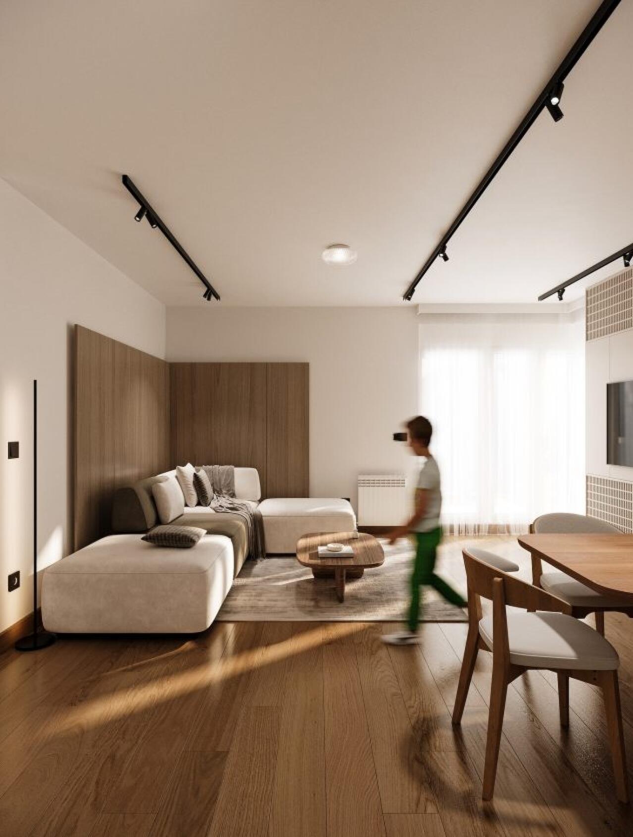 Četverosoban stan ima rješenje koje skriva sve što ne želimo gledati kroz topli drveni dizajn