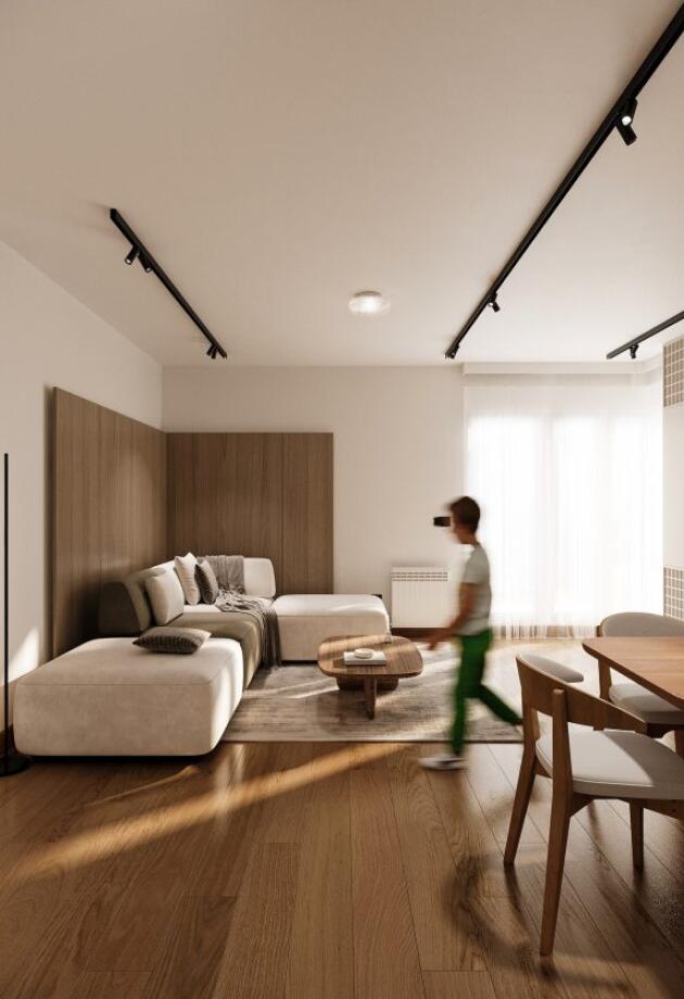 Četverosoban stan ima rješenje koje skriva sve što ne želimo gledati kroz topli drveni dizajn