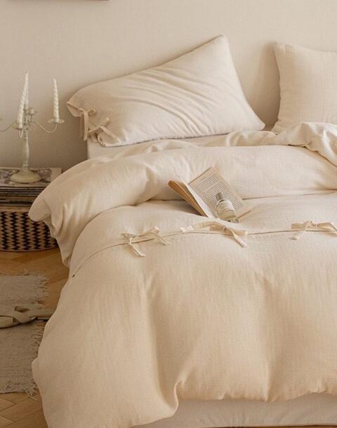 Set iz JYSK-a do danas na sniženju: Posteljina s mašnama kao najnježniji proljetni detalj