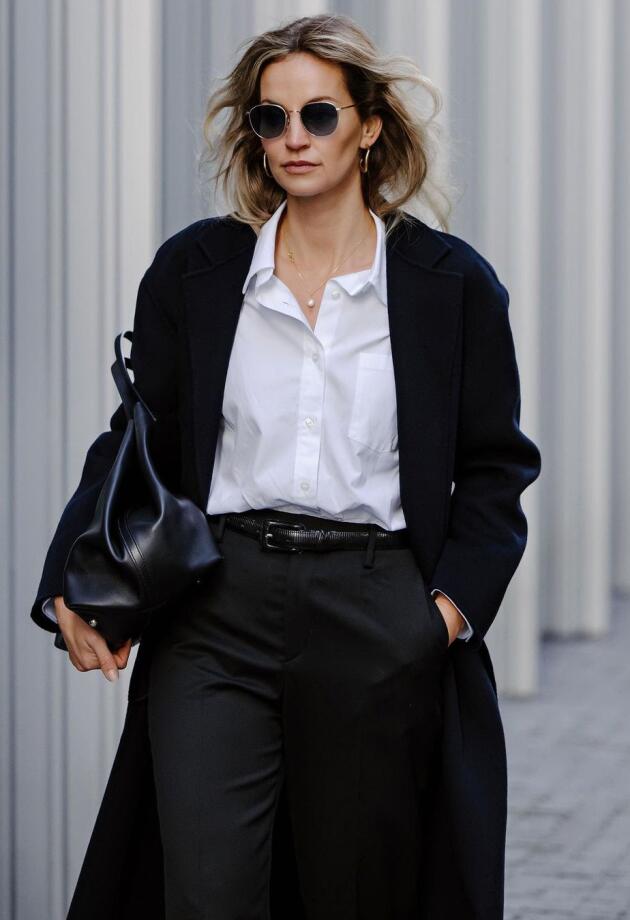 Casual ili poslovni look? Evo kako kombinirati bijelu košulju i crne hlače.