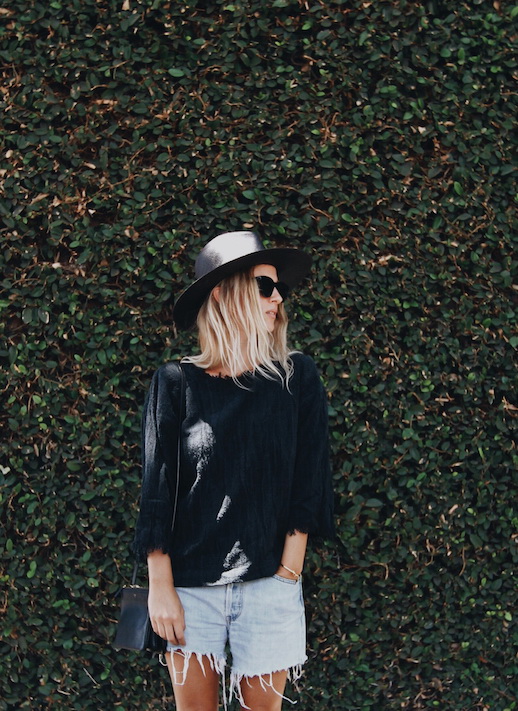 Le-Fashion-Blog-Black-Straw-Hat-Black-Raw-Hem-Sweater-Denim-Cut-Offs-Via-Mijaflatau